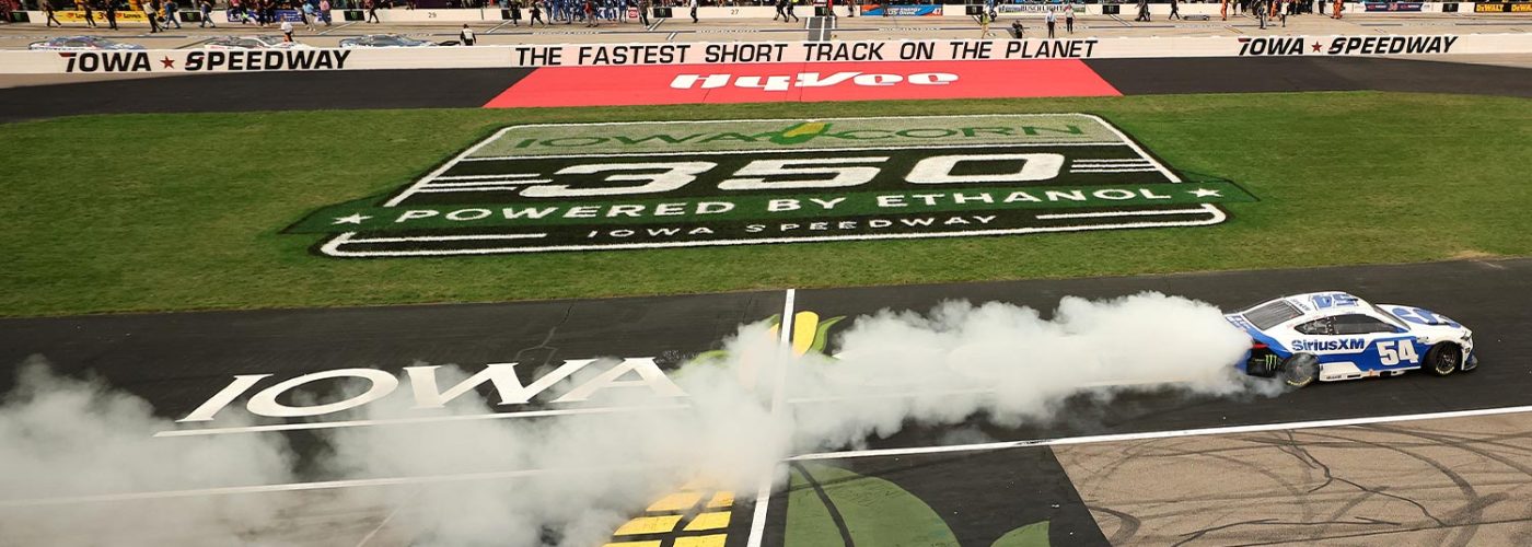 Ty Gibbs, driver of the #54 SiriusXM Toyota, celebrates with a burnout after winning the NASCAR Cup Series Iowa Corn 350 Powered by Ethanol at Iowa Speedway on August 09, 2026 in Newton, Iowa. (Photo by Chris Graythen/Getty Images)