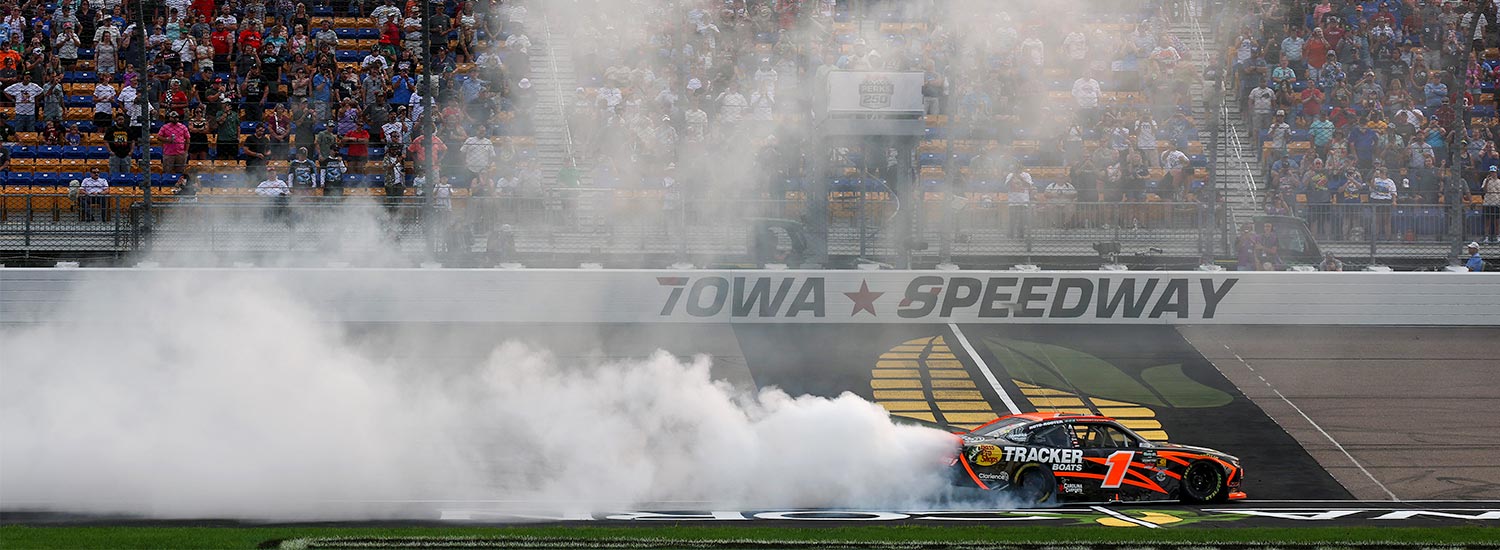 Carson Kvapil, driver of the #1 Bass Pro Shops Chevrolet, celebrates with a burnout after winning the NASCAR O'Reilly Auto Parts Series HyVee Perks 250 at Iowa Speedway on August 08, 2026 in Newton, Iowa. (Photo by Chris Graythen/Getty Images)