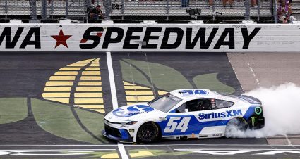 Ty Gibbs, driver of the #54 SiriusXM Toyota, celebrates with a burnout after winning the NASCAR Cup Series Iowa Corn 350 Powered by Ethanol at Iowa Speedway on August 09, 2026 in Newton, Iowa. (Photo by Sean Gardner/Getty Images)