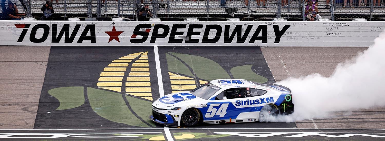 Ty Gibbs, driver of the #54 SiriusXM Toyota, celebrates with a burnout after winning the NASCAR Cup Series Iowa Corn 350 Powered by Ethanol at Iowa Speedway on August 09, 2026 in Newton, Iowa. (Photo by Sean Gardner/Getty Images)